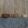 Product image 2 of the product “Salad bowls round, flat from teak root wood, Set of 3. Sizes: L: 31x31x10cm H. M:28x28x9cm H. S: 23x23x8cm H. ”